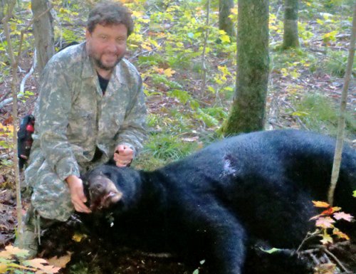 Bob Terry (above) with his Southern Bayfield County Boone and Crockett black bear